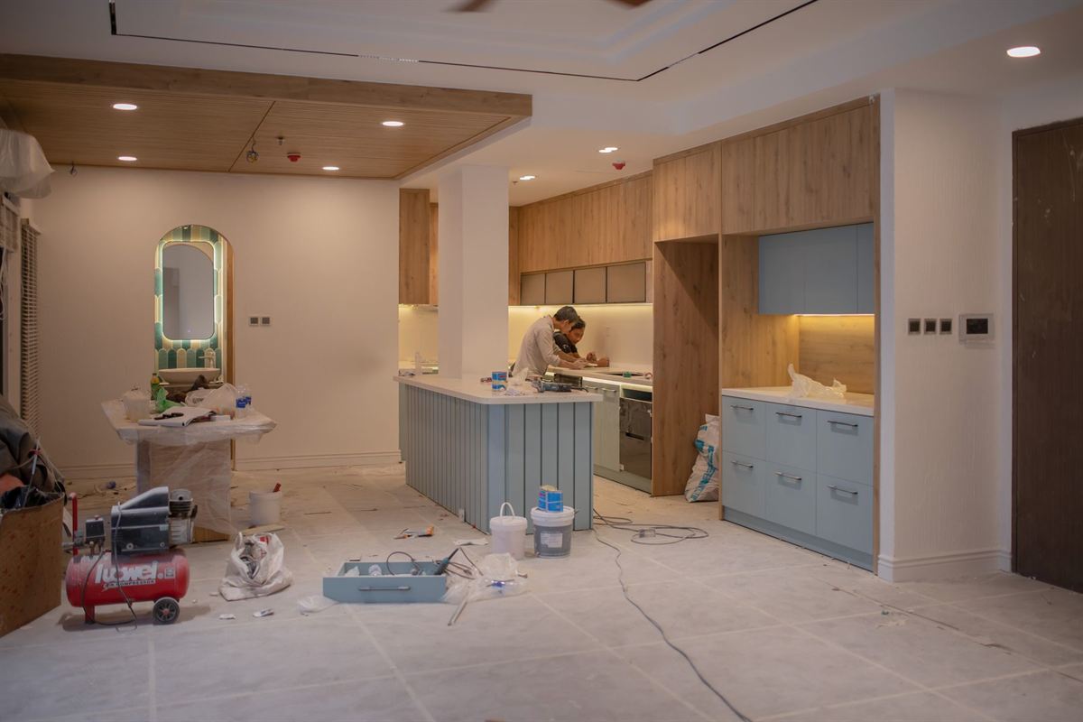 Crew working on a kitchen counter